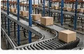 Roller conveyor system moving cartons